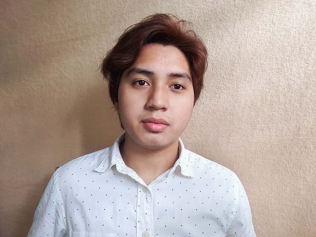 Portrait of Kenneth Sangalang